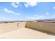 Spacious and private patio area with views of surrounding townhomes and mountains at 160 Lomita Heights Dr, Las Vegas, NV 89138