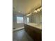 Bathroom features walk-in shower with a double sink vanity at 1785 Puerto Way, Henderson, NV 89012