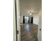 Spacious bedroom boasts hardwood floors, ceiling fan, and a window at 1785 Puerto Way, Henderson, NV 89012