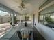 Relaxing covered patio area featuring a ceiling fan and outdoor dining set perfect for entertaining at 1785 Puerto Way, Henderson, NV 89012