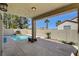 Inviting backyard featuring a refreshing pool and shaded patio space at 2388 Kenneth Ave, Henderson, NV 89052