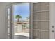 Balcony view showcasing lush palm trees and city views at 2388 Kenneth Ave, Henderson, NV 89052