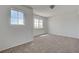 Neutral carpeted bedroom with a window offering plenty of natural light at 2388 Kenneth Ave, Henderson, NV 89052