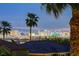 Las Vegas skyline view from rooftop with palm trees at 2388 Kenneth Ave, Henderson, NV 89052