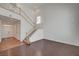 Bright entryway featuring wood floors, staircase, and a soaring two-story ceiling at 2388 Kenneth Ave, Henderson, NV 89052