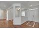 Bright entryway with tile flooring, arched openings, neutral paint, and a double-door entrance at 2388 Kenneth Ave, Henderson, NV 89052