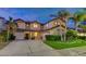Beautiful two-story home featuring mature landscaping and a three-car garage at 2388 Kenneth Ave, Henderson, NV 89052