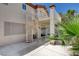View of the exterior, spiral staircase, and covered patio with access to a pool at 2388 Kenneth Ave, Henderson, NV 89052