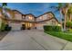 Charming two-story home with a well-manicured front yard and three-car garage at 2388 Kenneth Ave, Henderson, NV 89052