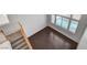 Entryway featuring stairs, hardwood railing, and a great view of the beautiful backyard swimming pool at 2388 Kenneth Ave, Henderson, NV 89052