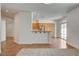 Well-lit kitchen with stainless steel appliances, breakfast bar, and seamless transition to the backyard at 2388 Kenneth Ave, Henderson, NV 89052