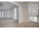 Open loft area with soft carpet and ample space for furniture, decor or entertaining at 2388 Kenneth Ave, Henderson, NV 89052