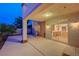 Outdoor patio with a spiral staircase and sliding glass doors to the kitchen at 2388 Kenneth Ave, Henderson, NV 89052