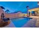 Backyard pool with fountain and spiral staircase to upper deck at 2388 Kenneth Ave, Henderson, NV 89052