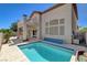Backyard pool and patio area in a desert setting at 2388 Kenneth Ave, Henderson, NV 89052
