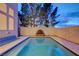 Backyard pool with mature trees and water feature at 2388 Kenneth Ave, Henderson, NV 89052