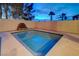Backyard pool with desert landscaping and privacy wall at 2388 Kenneth Ave, Henderson, NV 89052