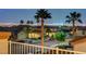 Charming neighborhood street with desert landscaping and stunning panoramic Las Vegas skyline view at 2388 Kenneth Ave, Henderson, NV 89052