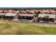 An aerial view features homes adjacent to a golf course. A lovely, quiet community to call home at 2625 Youngdale Dr, Las Vegas, NV 89134
