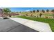 Beautifully landscaped backyard featuring rock features, an artificial grass area, and a golf course view at 2625 Youngdale Dr, Las Vegas, NV 89134