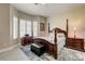 Main bedroom boasts decorative furniture, a ceiling fan, and ample natural light at 2625 Youngdale Dr, Las Vegas, NV 89134