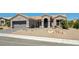 Charming single-story home with desert landscaping, covered entryway, and attached two-car garage at 2625 Youngdale Dr, Las Vegas, NV 89134