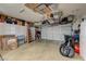 Clean, organized garage with ample storage, shelving, and space for bikes and other equipment at 2625 Youngdale Dr, Las Vegas, NV 89134