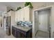 Kitchen counter with pantry in view, stainless steel appliances, and tile backsplash at 2625 Youngdale Dr, Las Vegas, NV 89134
