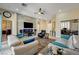 Comfortable living room with stylish decor, a large screen TV, and ample seating at 2625 Youngdale Dr, Las Vegas, NV 89134