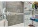 Spacious glass shower features designer tile and built-in shelving at 2625 Youngdale Dr, Las Vegas, NV 89134
