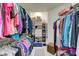 Well-organized walk-in closet with custom shelving and clothing racks at 2625 Youngdale Dr, Las Vegas, NV 89134