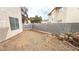 A spacious, private backyard features gravel, perfect for outdoor activities at 2722 Sweet Basil Dr, Las Vegas, NV 89142