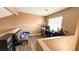 This living room offers a cozy space with a comfortable couch, laminate flooring, and natural light at 2722 Sweet Basil Dr, Las Vegas, NV 89142