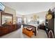 Spacious primary bedroom features a dresser, king bed and sitting area at 2809 Du Barry Manor Ln, Las Vegas, NV 89108