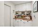 Butler's pantry features custom cabinets with decorative wood countertops at 2809 Du Barry Manor Ln, Las Vegas, NV 89108