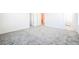 Spacious bedroom featuring plush carpeting and multiple doors at 3240 Avernus Ave, Henderson, NV 89044