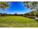 Expansive green space in community park offers a serene environment for relaxation and outdoor enjoyment at 3240 Avernus Ave, Henderson, NV 89044