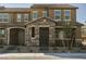 Attractive two-story townhome with stone facade and covered entryway at 3240 Avernus Ave, Henderson, NV 89044