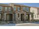 Charming townhome with a stone facade and well-maintained landscaping at 3240 Avernus Ave, Henderson, NV 89044