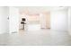 Open floor plan with modern kitchen featuring an island and white cabinetry at 3240 Avernus Ave, Henderson, NV 89044