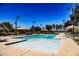 Community swimming pool with wading pool and lounge area for relaxation and fun in the sun at 3240 Avernus Ave, Henderson, NV 89044