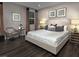 Inviting main bedroom featuring a king-size bed, stylish decor, and soft natural lighting at 3426 Oristano Ln, Henderson, NV 89044