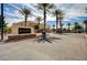Community Entrance featuring stacked stone and the community name sign 'Black Hawk' at 3936 Pepper Thorn Ave # 102, North Las Vegas, NV 89081