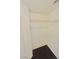 Walk-in closet with dark wood flooring and wire shelving at 3936 Pepper Thorn Ave # 102, North Las Vegas, NV 89081