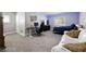 Bedroom with hardwood floors, a large window, and neutral paint with modern furniture at 3950 Oakridge Ave, Pahrump, NV 89048