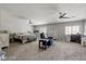 Spacious main bedroom features neutral colors, ceiling fan and large windows at 3950 Oakridge Ave, Pahrump, NV 89048