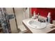 Bathroom featuring a sink, shower with glass door, and tiled flooring at 4119 Meadowglen Cir, Las Vegas, NV 89121