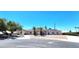 Charming single-story home featuring drought landscaping, a paved driveway, and solar panels on the roof at 4119 Meadowglen Cir, Las Vegas, NV 89121