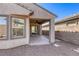 Charming backyard patio with a covered area, perfect for outdoor lounging and enjoying the serene outdoor setting at 4124 Gliding Gulls Ave, North Las Vegas, NV 89084
