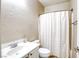 Bright bathroom showcasing a vanity with sink, toilet, and a shower with a clean, modern aesthetic at 4124 Gliding Gulls Ave, North Las Vegas, NV 89084